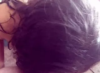 amateur couple enjoys time by the fireplace