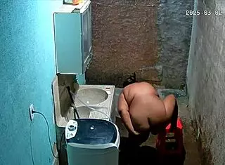 The stepmom shaves her pussy while the stepson secretly watches from the camera.