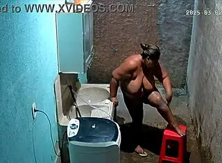 The stepmom shaves her pussy while the stepson secretly watches from the camera.