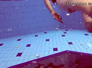 Libuse, the sexy petite Russian teen with small tits, hangs out at the pool and beach with her blonde girlfriend babe.