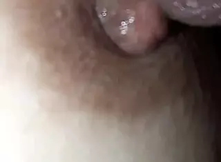 nipple covered in saliva, licking the glans