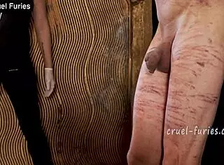 cruel blonde milf whipping guy's cock!