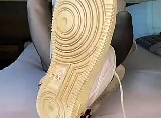 Blacknails feet in nylon fetish with nike airforce nylontights on girl