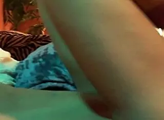 Two girls using toys in lesbian sex