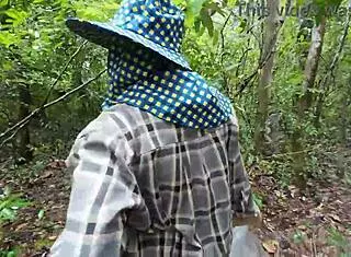 i feel so excited and naughty as this thai teen walks chatting picking mushrooms in the forest showing off cosplay in nature alone