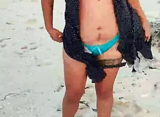 Mexican Whore Exhibits Tits and Ass on Public Beach