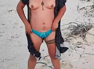 Mexican Whore Exhibits Tits and Ass on Public Beach