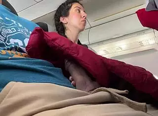 This teen amateur flashes her cute brunette pigtails on the airplane. She gives a quick public handjob leading to huge cumshot in just two minutes.