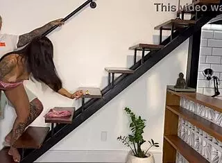 ebony babe rides latina in cowgirl with swollen pussy and muscular bodybuilder lingerie on stairs