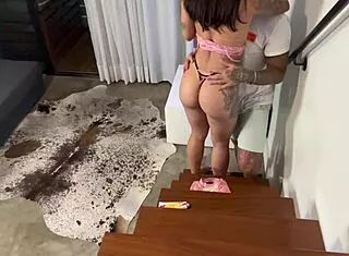 ebony babe rides latina in cowgirl with swollen pussy and muscular bodybuilder lingerie on stairs