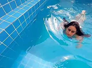 Surprised my stepsister at the pool with my hard erect cock pressing against her