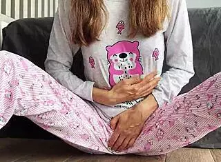 Skinny teen in pajamas played with her small tits and fingered her pussy until she squirted everywhere.