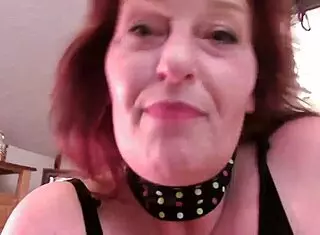 redhead mature dawnskye feels sexy in lingerie and fishnets