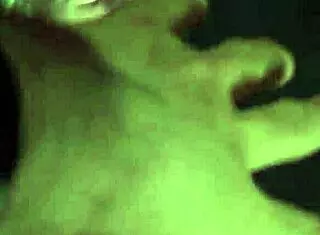 police officer engages in intense group encounter with masked figure at work