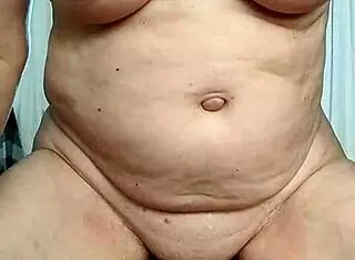 in this homemade video, a naughty housewife with natural tits swaps her dildo for intense orgasmic toy play