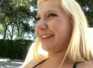 I love how these two beautiful blondes kiss by the pool, fingering and licking each other's big tits and pussies in lesbian passion.