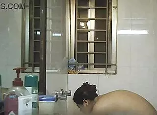 Voyeur spies on Indian bbw with big natural tits and fat curves in shower.