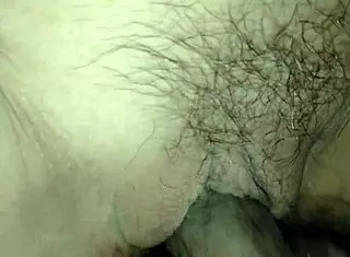 Wife explores anal for the first time, feeling tight and wet. She reaches orgasm with creampie in shaved pussy.