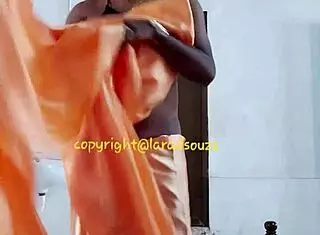 indian crossdresser lara dsouza struts in orange satin saree like a sexy slut