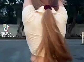 Titstoker girl displays impressive big tits in captivating style