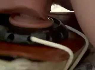 Watch this sexy redhead housewife stuff huge dildo in her tight pussy on bed without cumming too fast