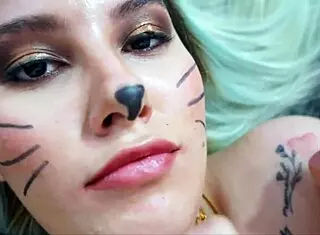 Bella embodies seduction as a captivating feline presence.