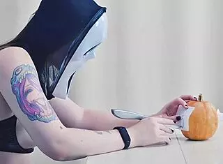 I feel excited carving erotic pumpkin for trick or treat with sexy ghostface.