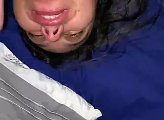 in a steamy scene a teen experiences a facial that lands right on her glasses leaving her surprised