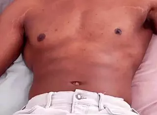 Big muscular bodybuilder shows off monster big black cock