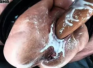 Oh yeah, this fat mama adores her huge hairy pussy getting stretched wide by massive dildo