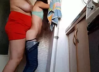 i got so turned on when my milf boss used a strapon on me by the fridge at work