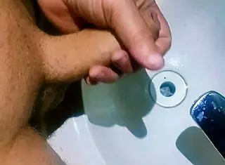 Hidden Man in Bathroom Sink Releases Semen in Exotic Homemade Shower Scene