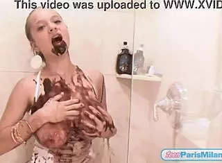 This chocolate-covered teen Paris Milan starts with a steamy shower, undressing slowly. She teases with her big tits and petite body in a French-Colombian style.
