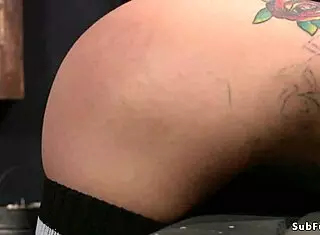 Busty Babe Bent Over for Intense Ass Caning in Tight Bondage!