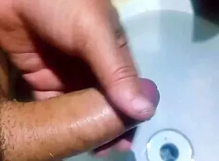 Hidden Man in Bathroom Sink Releases Semen in Exotic Homemade Shower Scene
