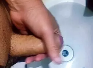 Hidden Man in Bathroom Sink Releases Semen in Exotic Homemade Shower Scene