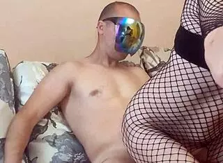 Wife in fishnet bodysuit gets ass play in homemade milf scene