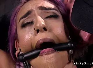 purple haired petite 18+ sub in device bondage