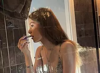 Petite College Cheerleader Teases In Bathroom Starting With Panties Then Reveals Tight Pussy Under Miniskirt