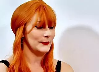 Vicky the beautiful redhead French milf craves a big cock in lingerie