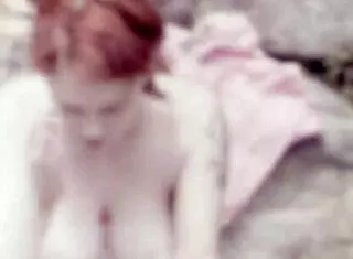Redhead still craves more after lake creature licks her wet pussy in outdoor fantasy