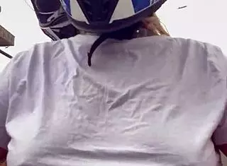 Motogirl from 99 picks up male passenger and asks him to rub her nipple tips while riding