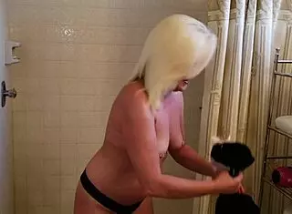 uhh insiders info with this hot horny milf showing her shaved pussy and pierced nipples in bathroom