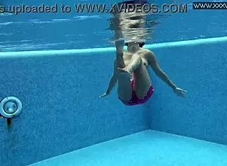 Lady Dee, cute shy Czech teen, swims in pool. She teases with tight petite body and juicy small tits outdoors.