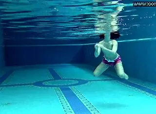 Lady Dee, cute shy Czech teen, swims in pool. She teases with tight petite body and juicy small tits outdoors.