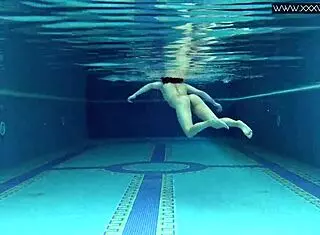 Lady Dee, cute shy Czech teen, swims in pool. She teases with tight petite body and juicy small tits outdoors.