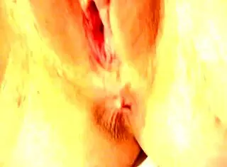 amatuer pink pussy gets showcased in a simple homemade close-up scene that highlights its natural look and subtle details