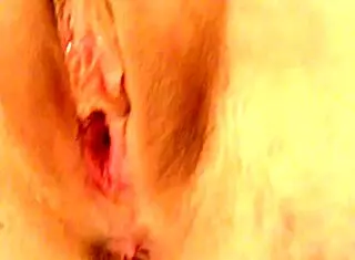 amatuer pink pussy gets showcased in a simple homemade close-up scene that highlights its natural look and subtle details