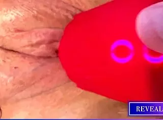 Revealme horny milf dives into intense solo fingering and vibrator action on tight wet pussy until explosive orgasm.