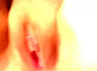 amatuer pink pussy gets showcased in a simple homemade close-up scene that highlights its natural look and subtle details